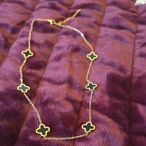 Elegant Gold and Black Clover Necklace